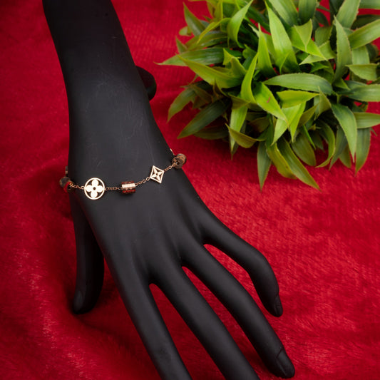 Premium bracelet with floral and geometric charms - Revaaj