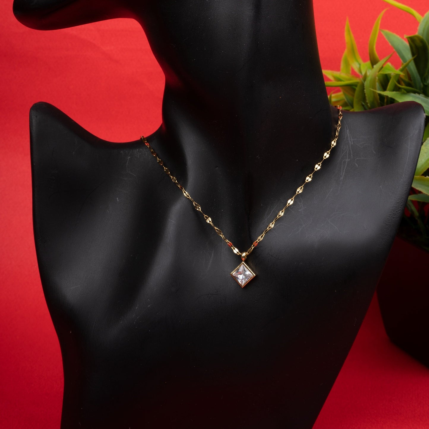 Golden square crystal necklace with matching earrings in gold-tone finish second view - Revaaj
