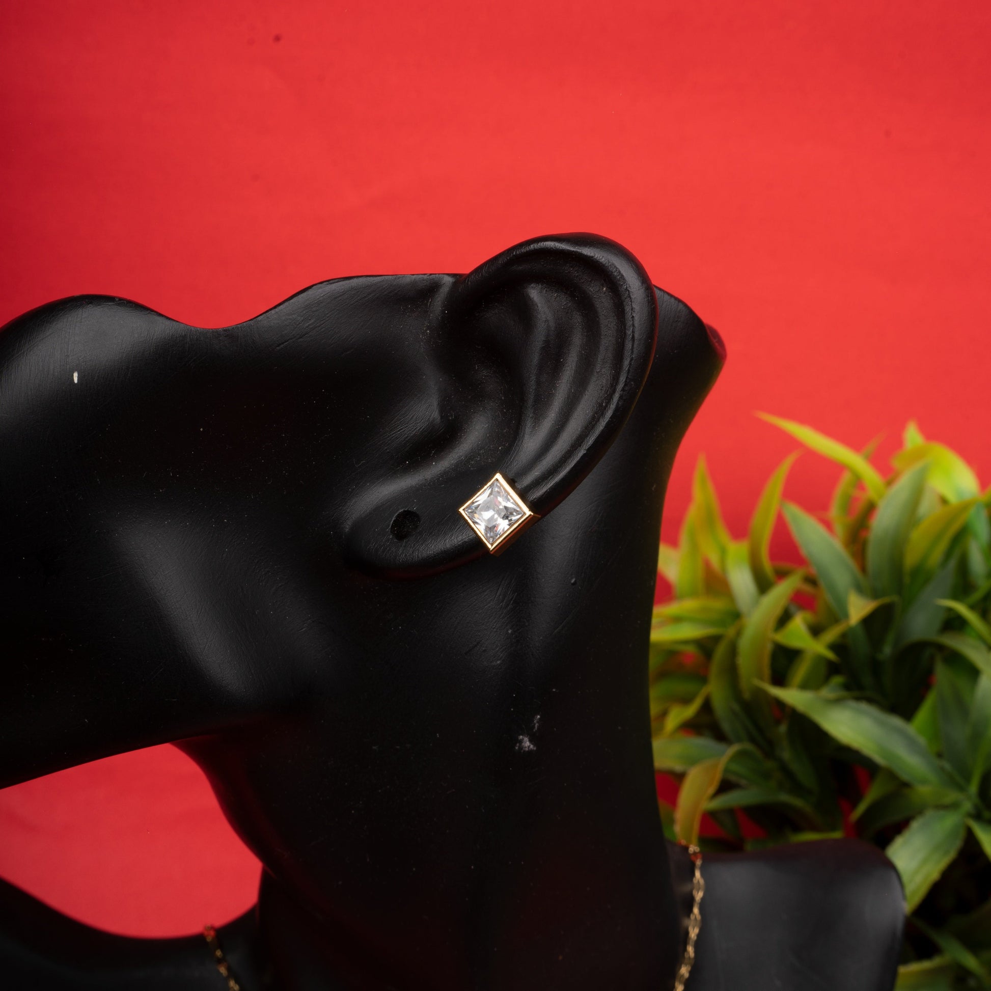 Golden square crystal necklace with matching earrings in gold-tone finish third view - Revaaj