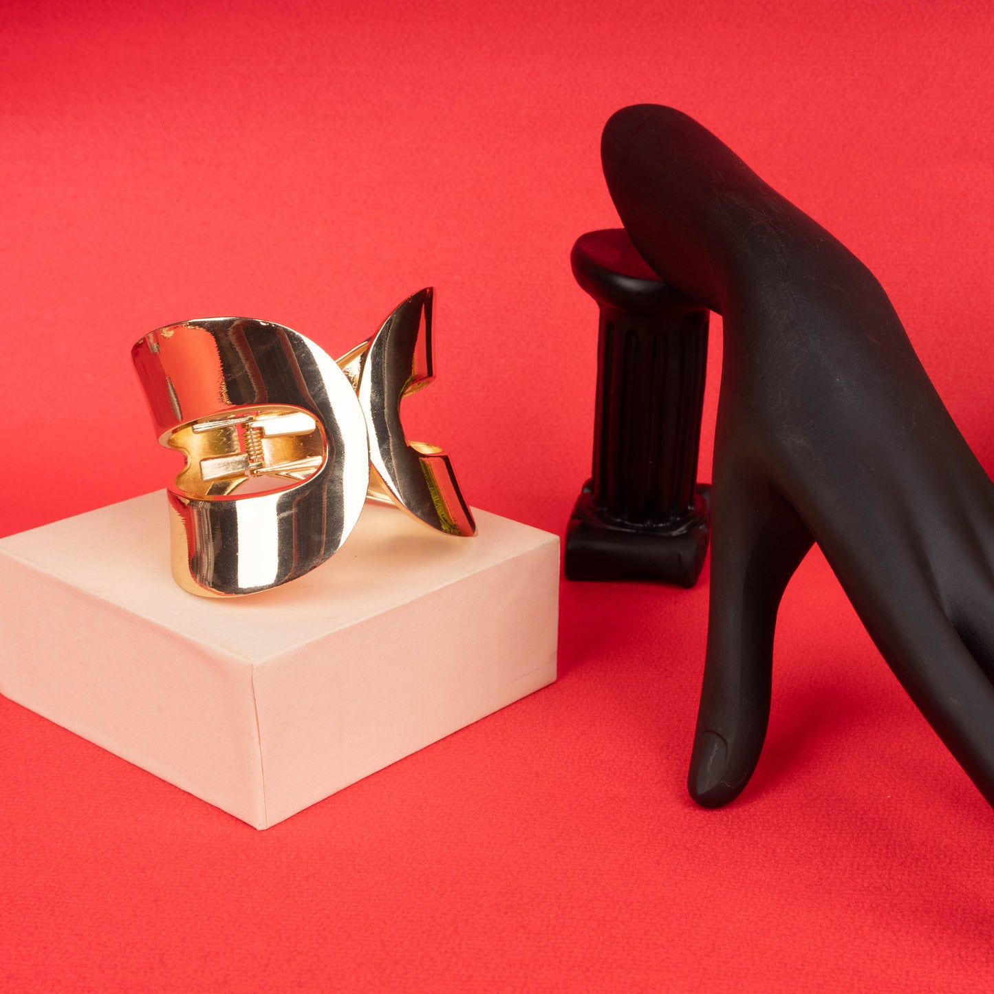 Bold gold statement cuff bracelet with abstract sculptural design - Revaaj