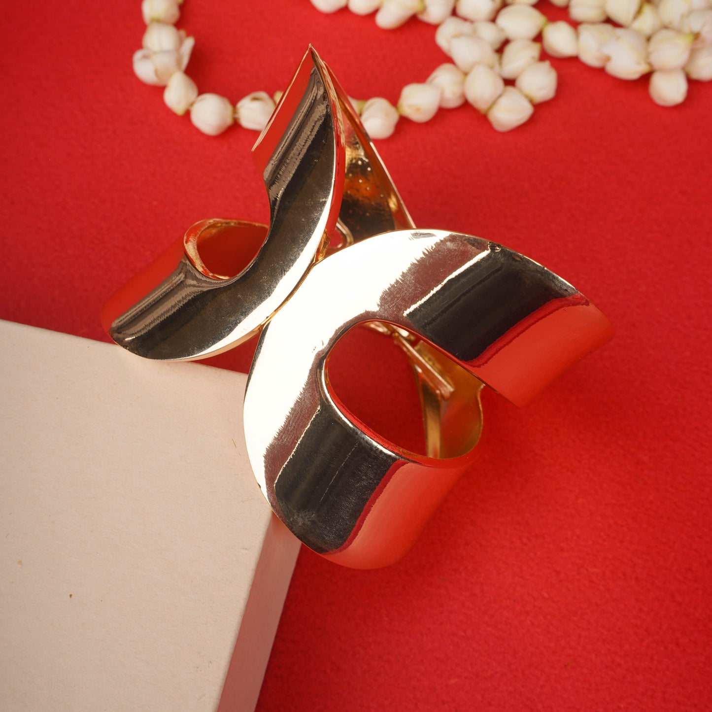 Bold gold statement cuff bracelet with abstract sculptural design - Revaaj Ground