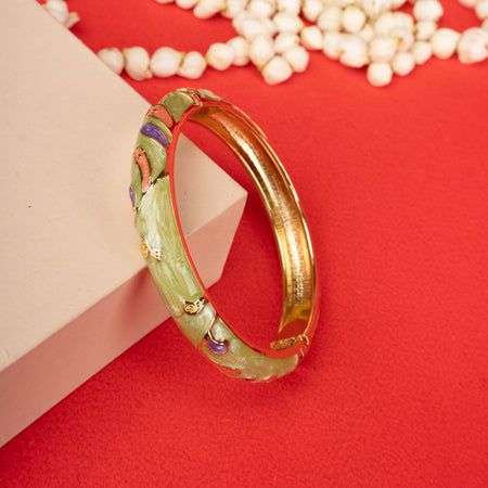 Gleaming dual-band, open-cuff bracelet on a black mannequin hand - Revaaj