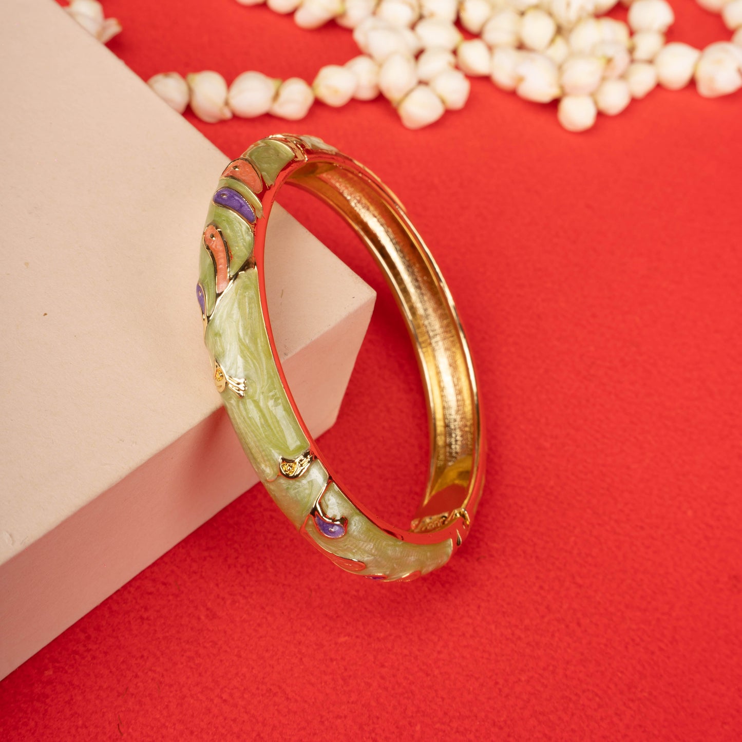 Gleaming dual-band, open-cuff bracelet on a black mannequin hand - Revaaj