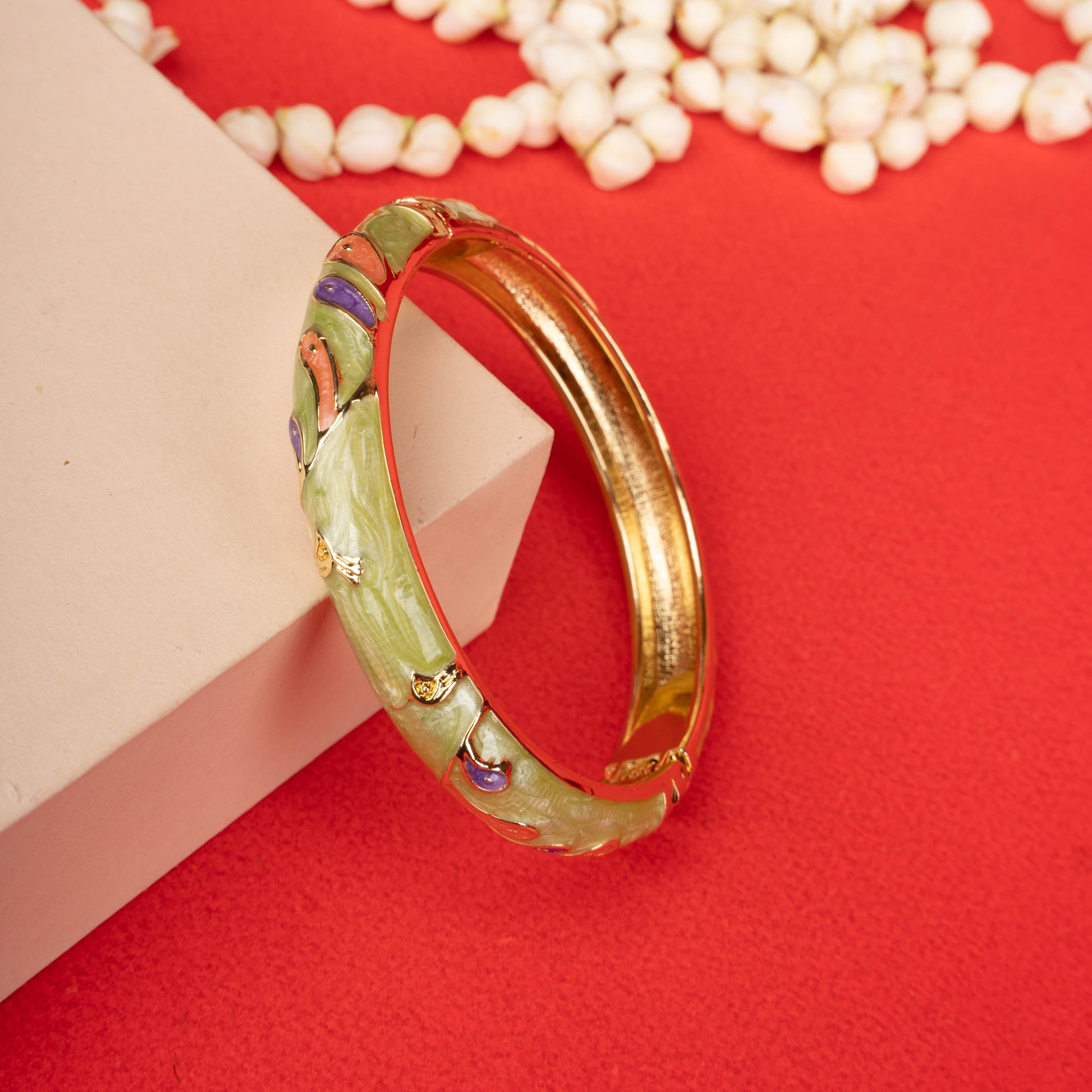 Gleaming dual-band, open-cuff bracelet on a black mannequin hand - Revaaj