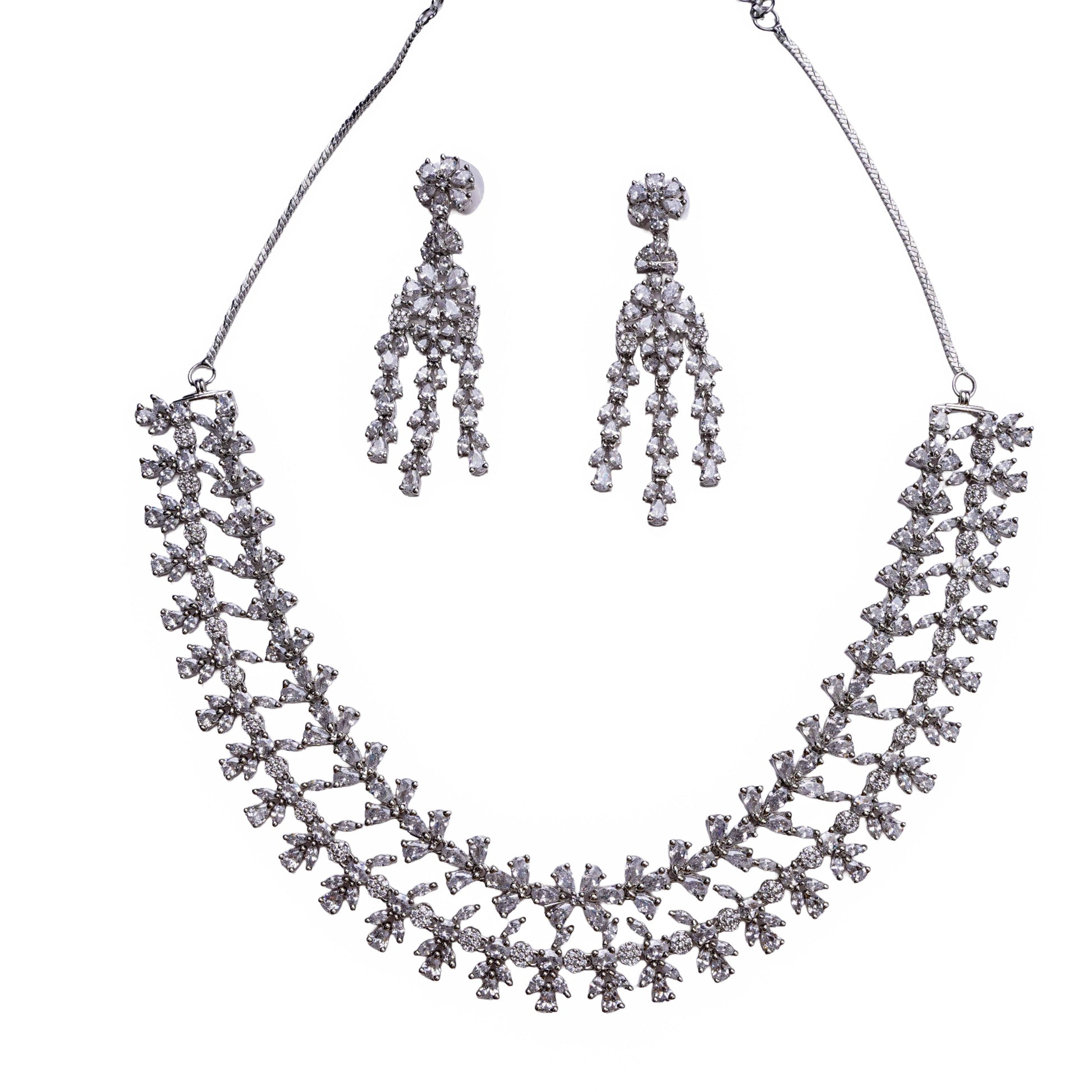 Necklace and earring set with floral motif clear stones in double-layered design on white background