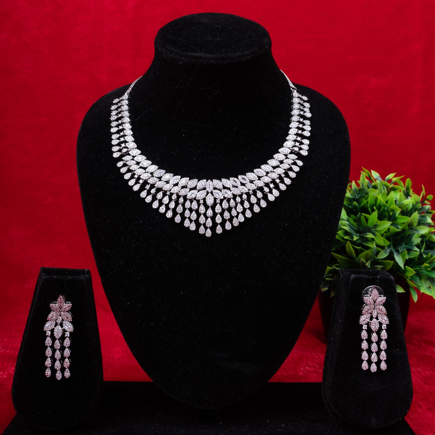 Crystal leaf motif necklace set with marquise and teardrop crystals - Revaaj