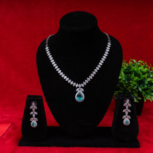 Emerald leaf elegance necklace set with green teardrop pendant and matching earrings - Revaaj