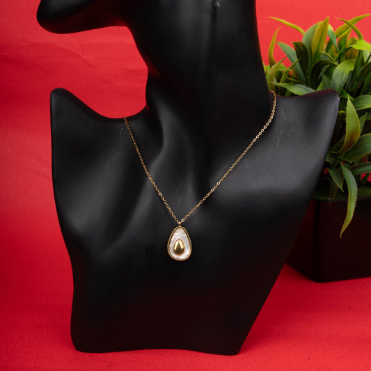 Gold-tone teardrop pendant necklace with polished accent - Revaaj