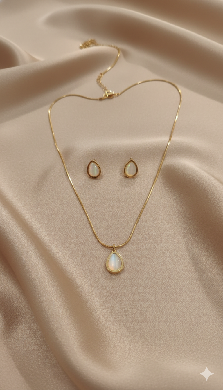 Gold-Plated Teardrop Pearl Pendant Necklace with Matching Stud Earrings Set stand