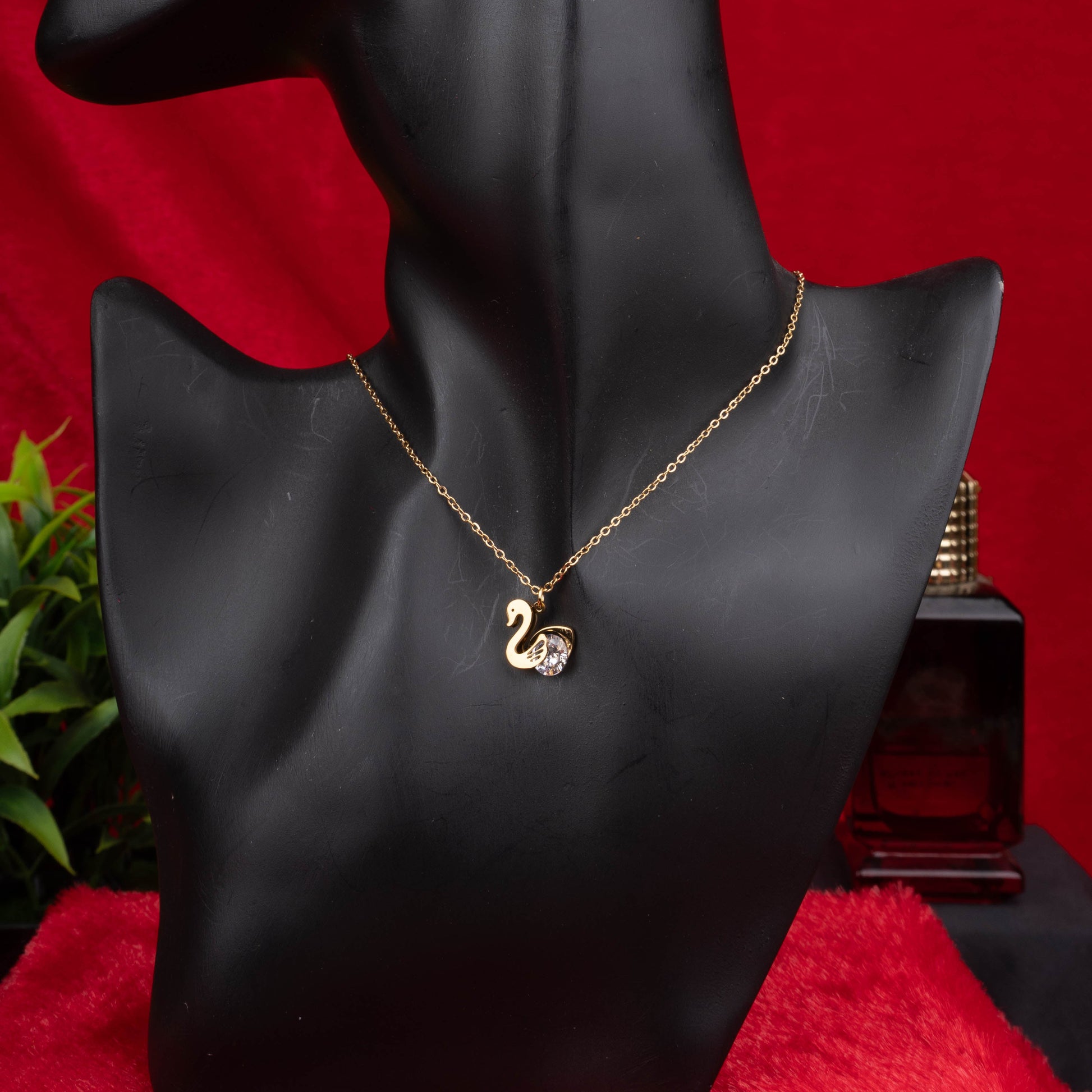 Gold swan pendant necklace with crystal accent - Revaaj