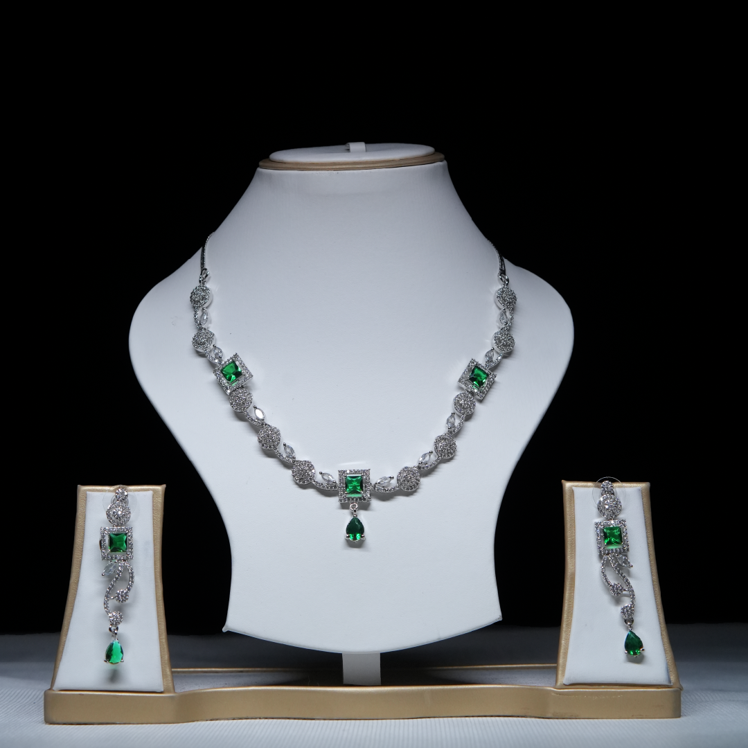 Revaaj Emerald and Cubic Zirconia Necklace and Earring Set displayed on a white mannequin.