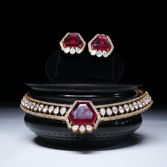 Revaaj Red Ruby and White Zirconia Choker Necklace Set displayed on a black stand.