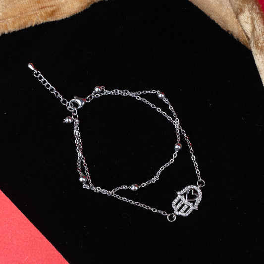 Premium dual-layer bracelet with Hamsa charm and heart centerpiece - Revaaj