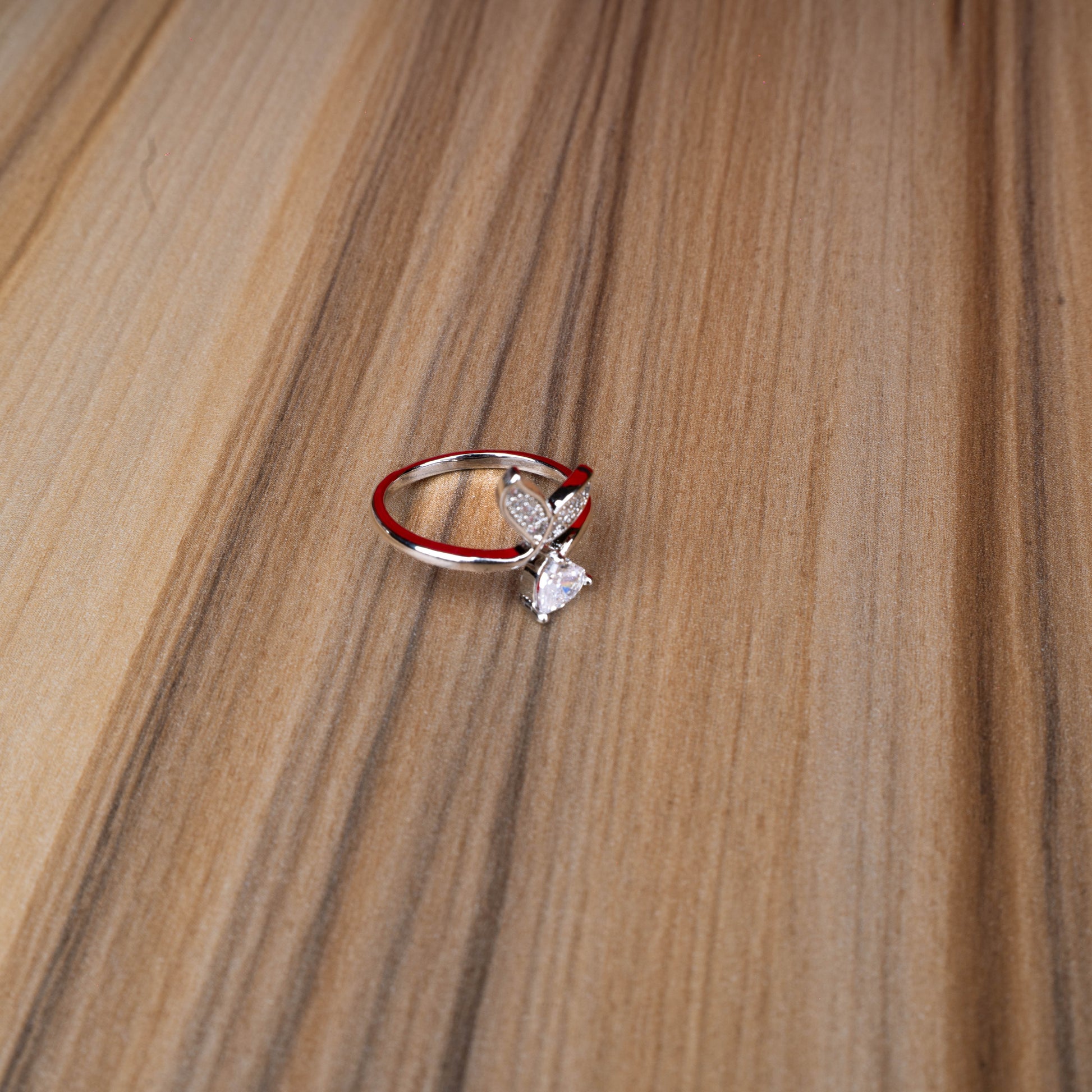 Elegant bow crystal adjustable ring with sparkling stones second view - Revaaj