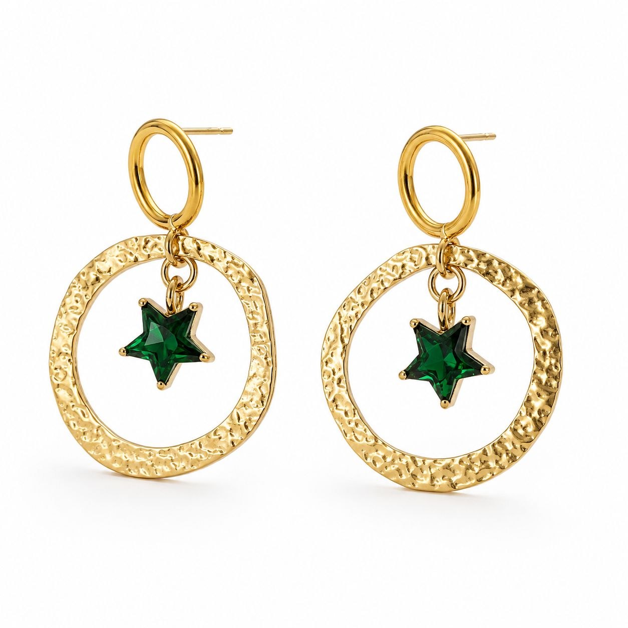 Pair of gold hammered circular hoop earrings with dangling green star crystal pendants on white background 1