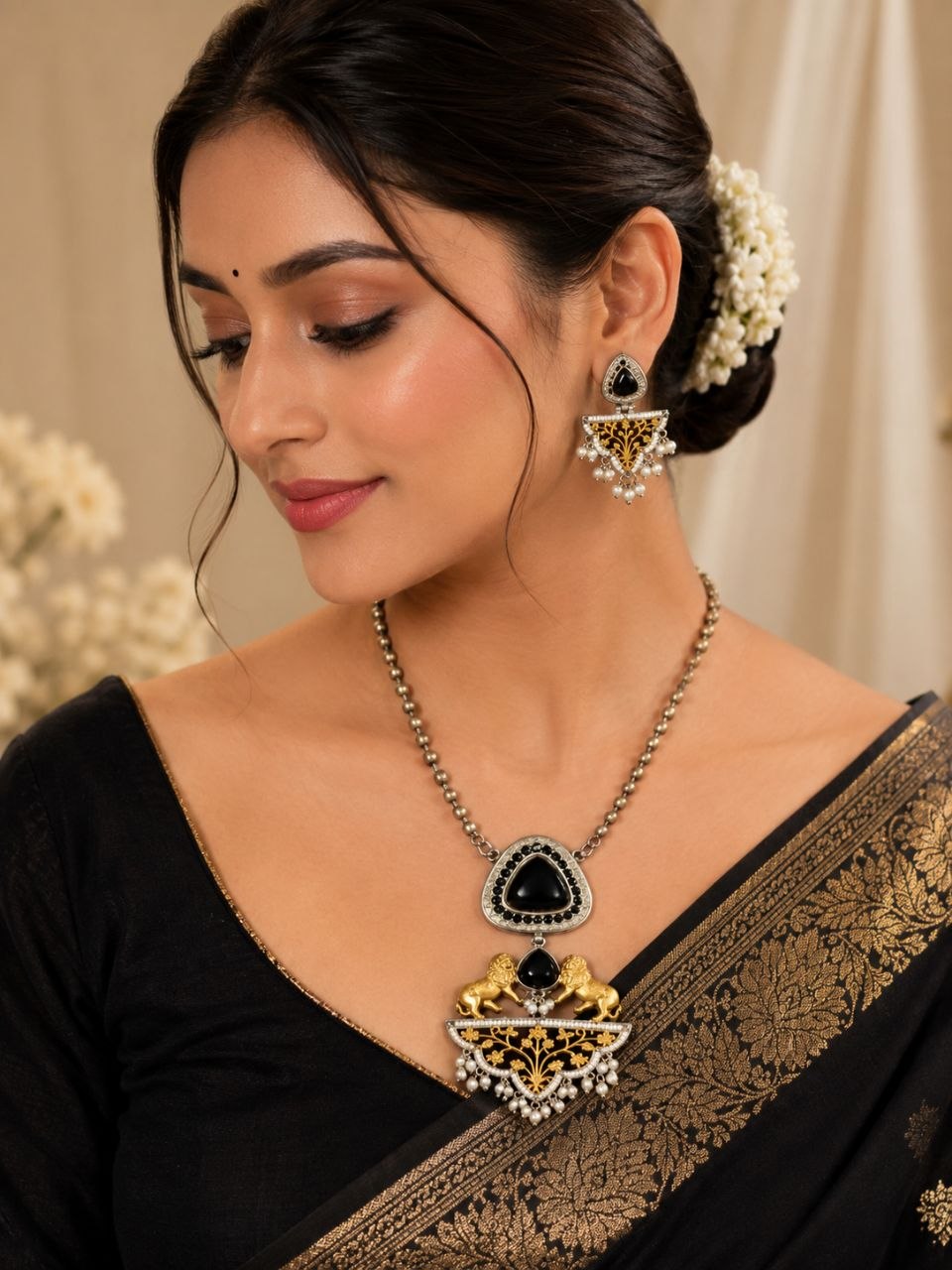 Royal black and gold Indian necklace set with lion motifs, large black stone pendant, pearl details and matching drop earrings on black display bust 2