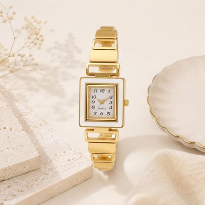 Premium gold square face women's watch with white dial, gold hands, and geometric gold metal link band on white background 3