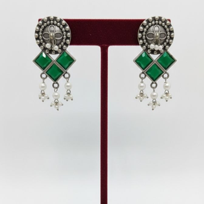 Traditional Indian oxidized silver earrings featuring square green gemstones and dangling white pearl drops 3