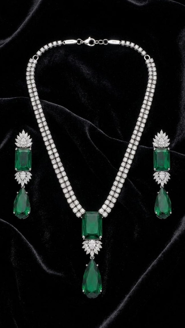 Premium emerald green rectangular and teardrop diamond necklace with matching drop earrings set in silver 3
