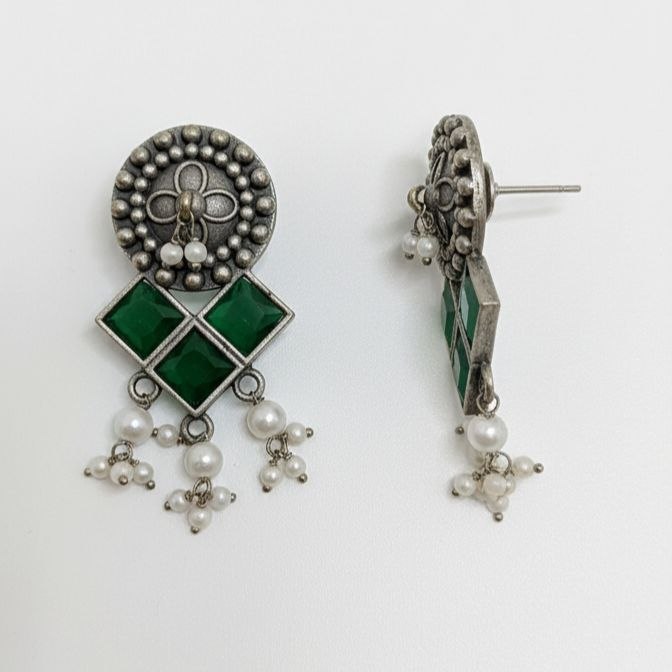 Traditional Indian oxidized silver earrings featuring square green gemstones and dangling white pearl drops 1