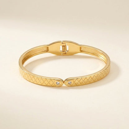 Elegant Textured Gold Bangle Bracelet with Crystal Detailing