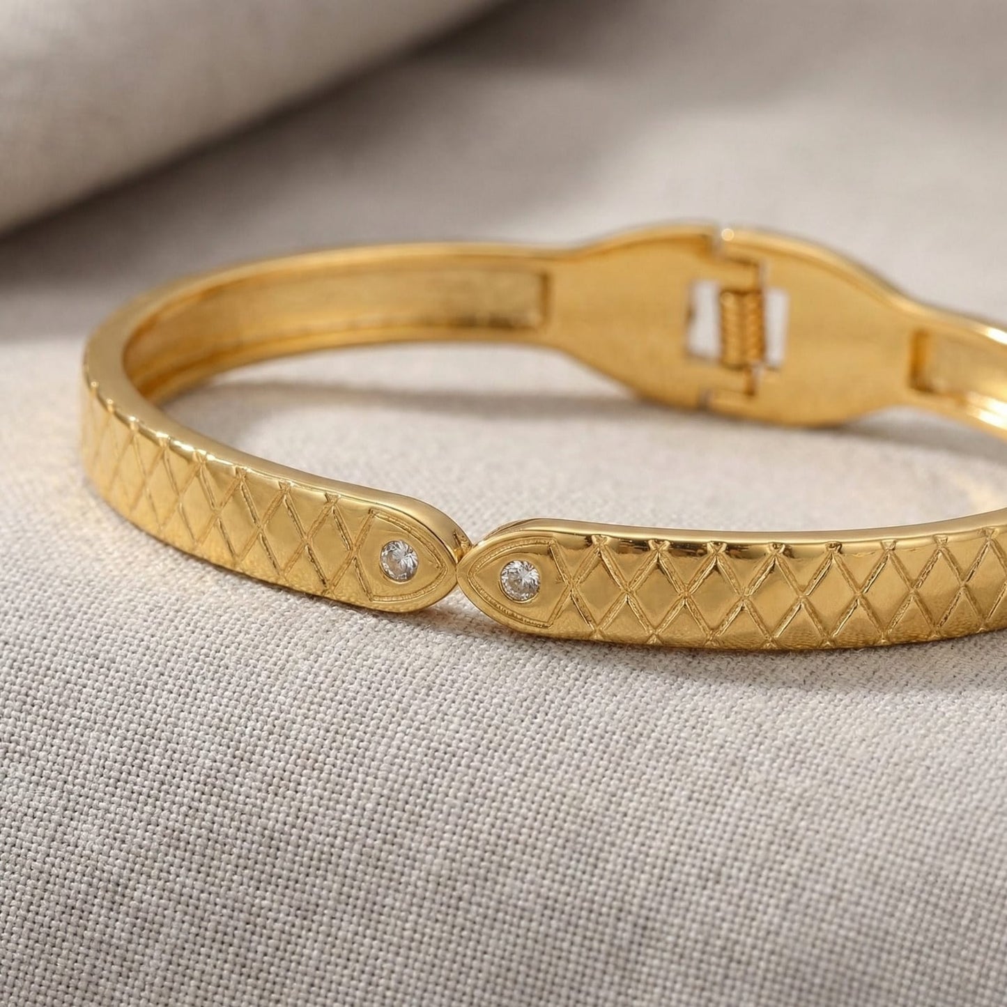 Elegant Textured Gold Bangle Bracelet with Crystal Detailing