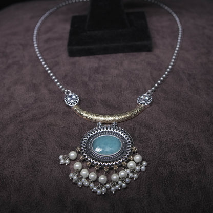 Vintage oxidized silver necklace set with mint green stone pendant and pearl drops, paired with matching earrings 