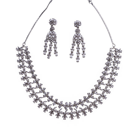 Necklace and earring set with floral motif clear stones in double-layered design on white background