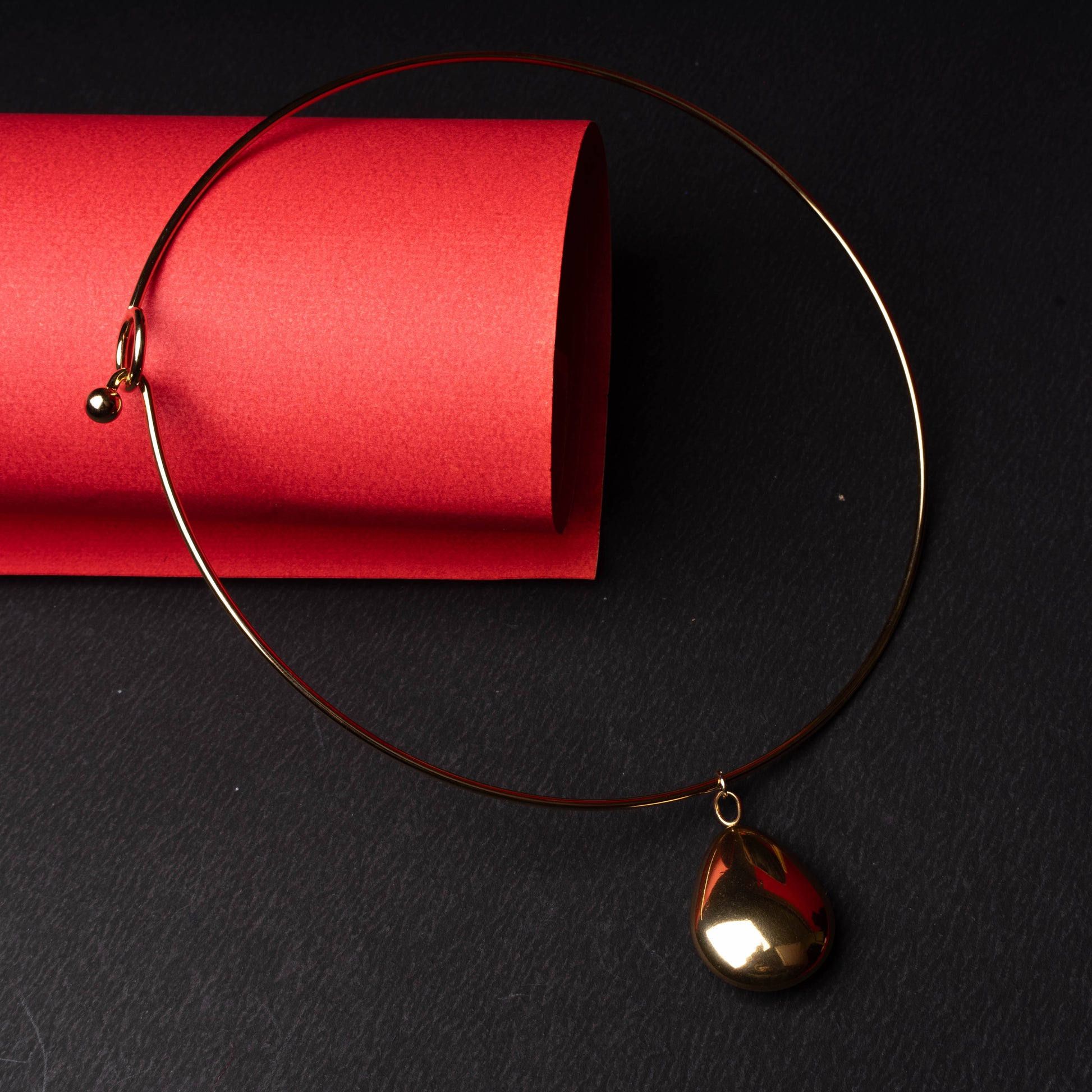 Minimalist teardrop choker necklace with polished metallic finish second view - Revaaj