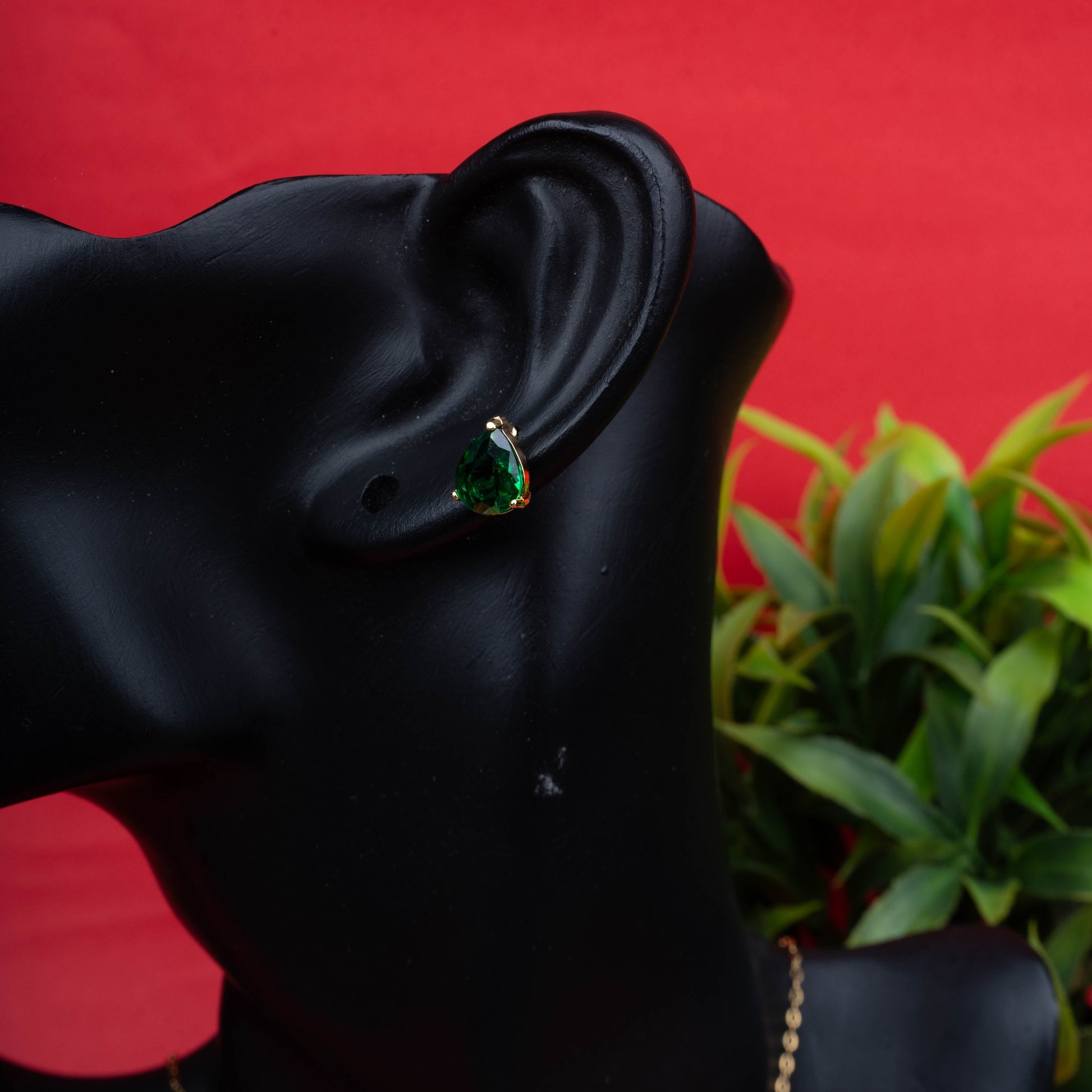 Emerald teardrop pendant necklace with matching green stone stud earrings second view - Revaaj