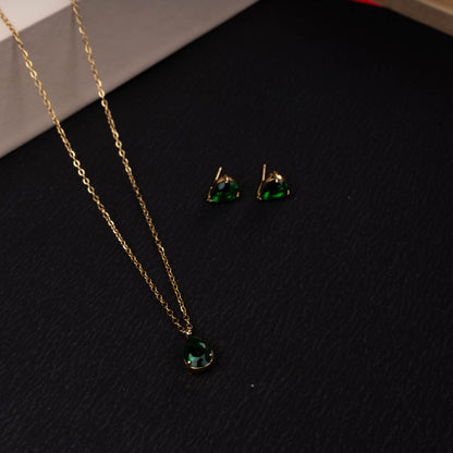 Emerald teardrop pendant necklace with matching green stone stud earrings third view - Revaaj