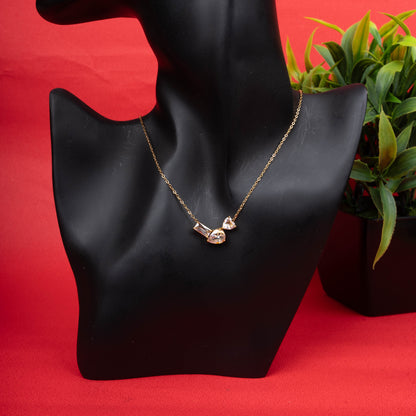 Gold-tone necklace with three asymmetrical clear crystal stones - Revaaj