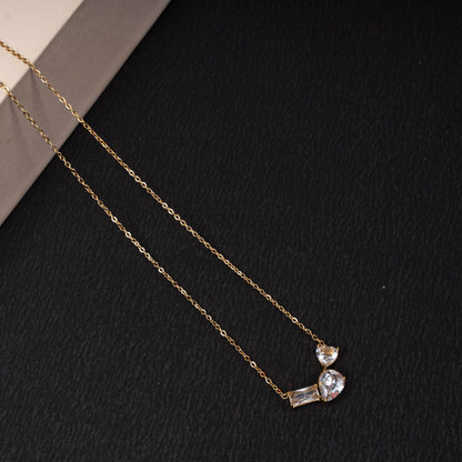 Gold-tone necklace with three asymmetrical clear crystal stones second view - Revaaj