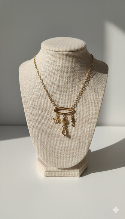 Gold-Plated Sea Charm Necklace with Starfish, Shell, Seahorse, and Pearl Drop