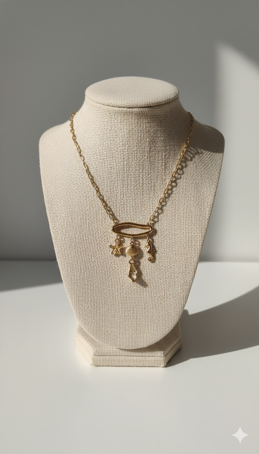 Gold-Plated Sea Charm Necklace with Starfish, Shell, Seahorse, and Pearl Drop