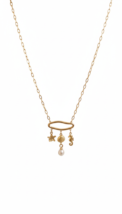 Gold-Plated Sea Charm Necklace with Starfish, Shell, Seahorse, and Pearl Drop white