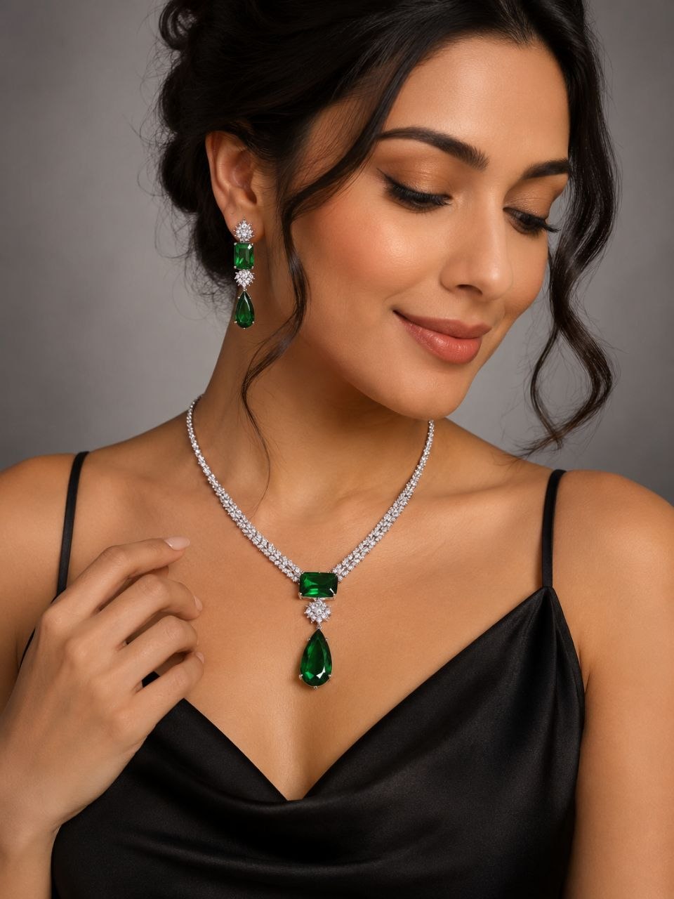 Premium emerald green rectangular and teardrop diamond necklace with matching drop earrings set in silver 2