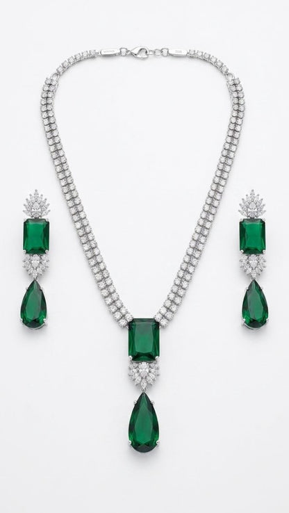 Premium emerald green rectangular and teardrop diamond necklace with matching drop earrings set in silver 1