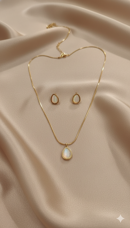 Gold-Plated Teardrop Pearl Pendant Necklace with Matching Stud Earrings Set stand