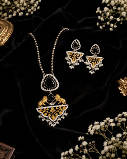 Royal black and gold Indian necklace set with lion motifs, large black stone pendant, pearl details and matching drop earrings on black display bust 3