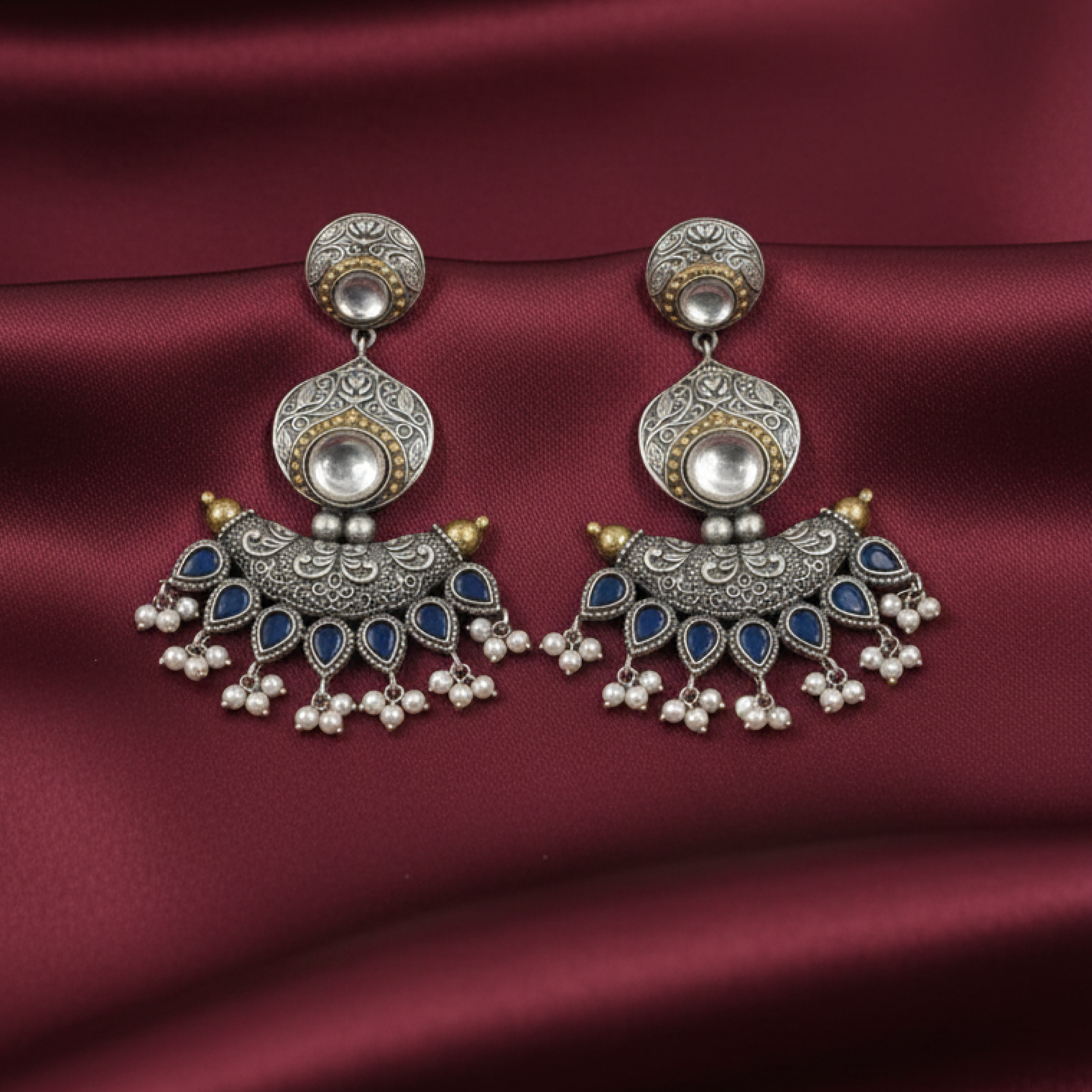 Oxidized Silver Peacock Jhumka Earrings with Green Stones and Dual Bird Design white