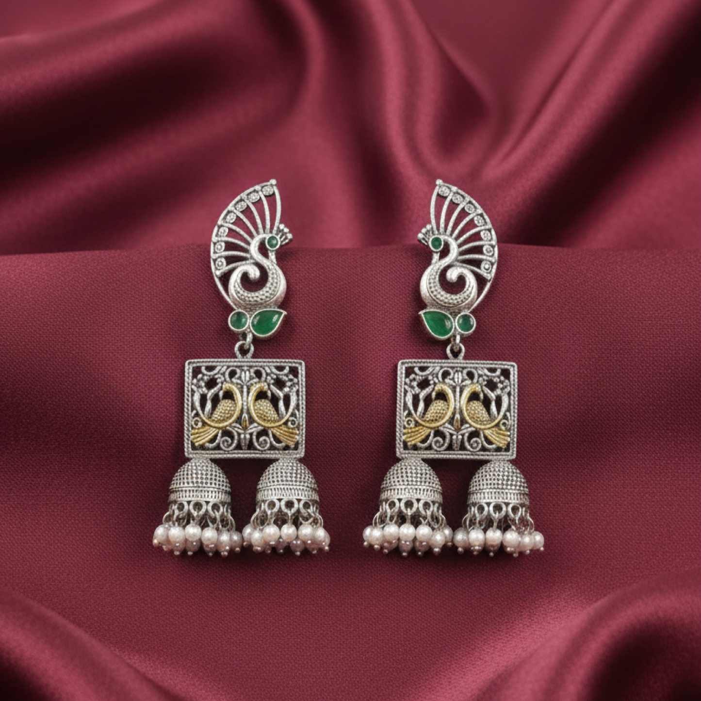 Oxidized Silver Peacock Jhumka Earrings with Green Stones and Dual Bird Design white