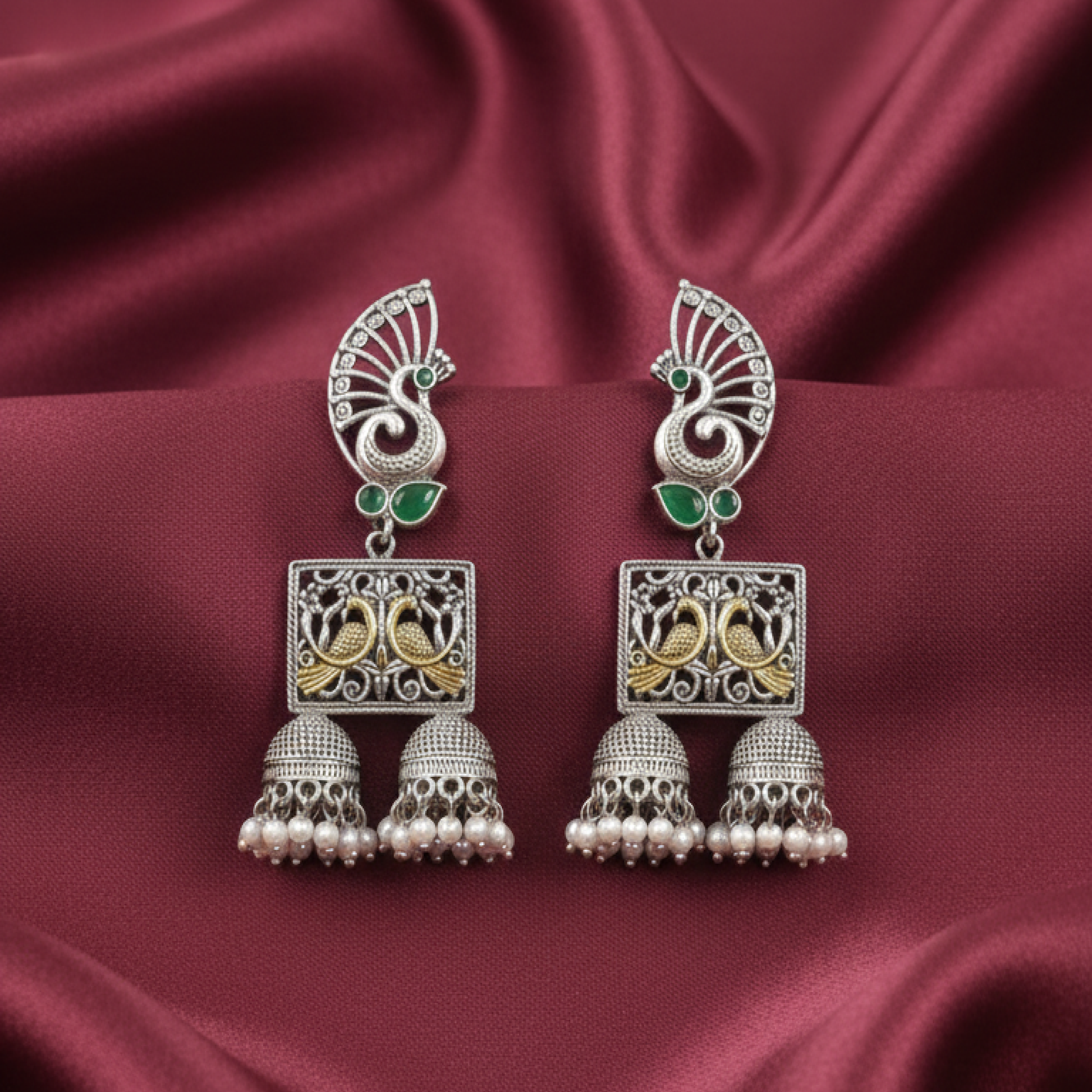 Oxidized Silver Peacock Jhumka Earrings with Green Stones and Dual Bird Design white