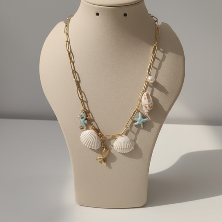 Gold-Plated Ocean Charm Necklace with Seashell, Starfish, and Seahorse Pendants