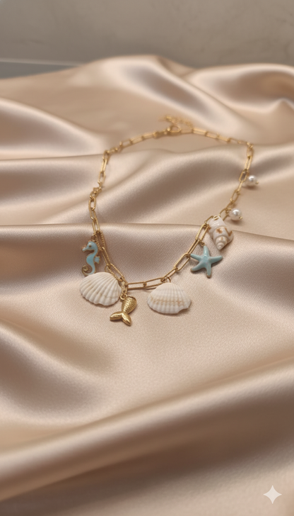 Gold-Plated Ocean Charm Necklace with Seashell, Starfish, and Seahorse Pendants