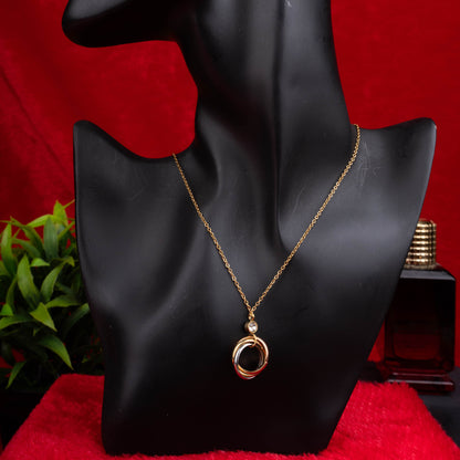 Gold necklace with three interlocked rings pendant and a clear crystal accent - Revaaj