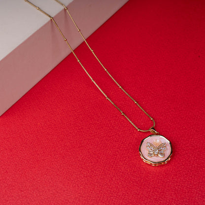 Gold chain necklace with round pink enamel butterfly pendant another view - Revaaj