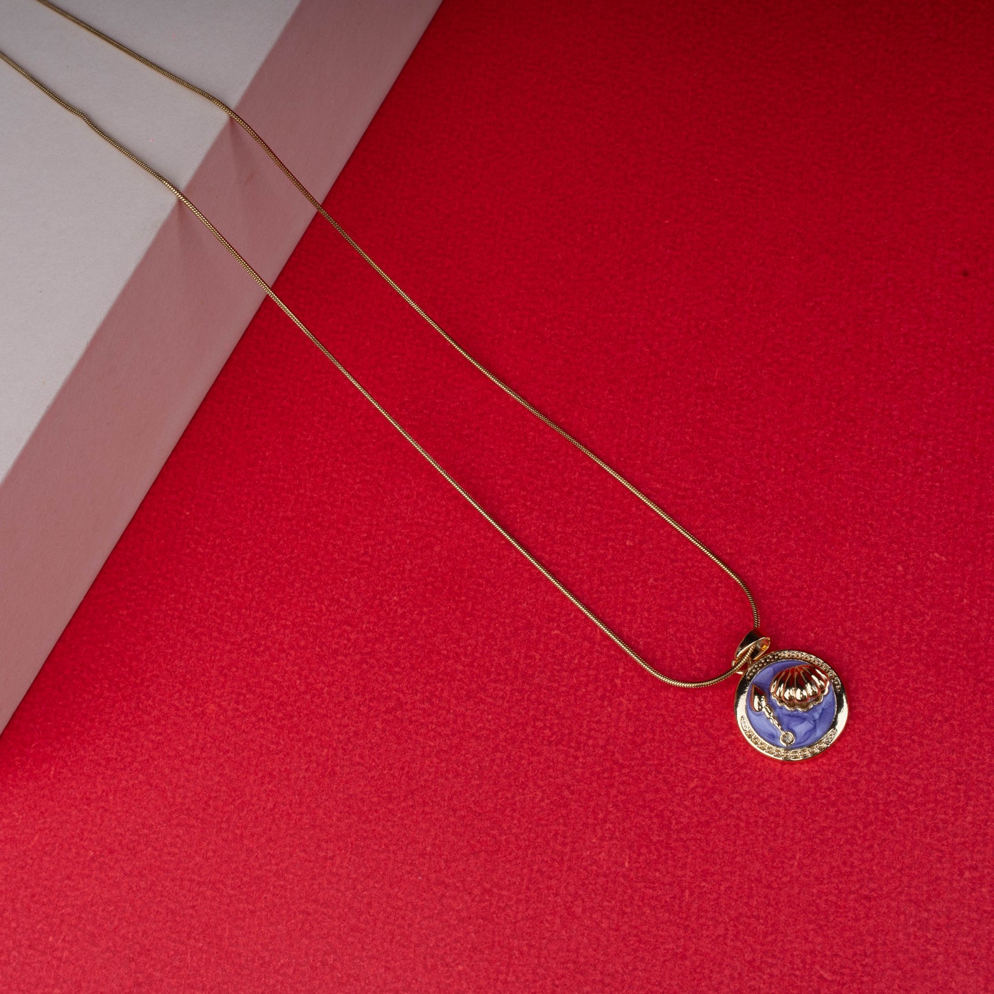 Gold chain necklace with pink enamel pendant featuring a crystal butterfly - Revaaj