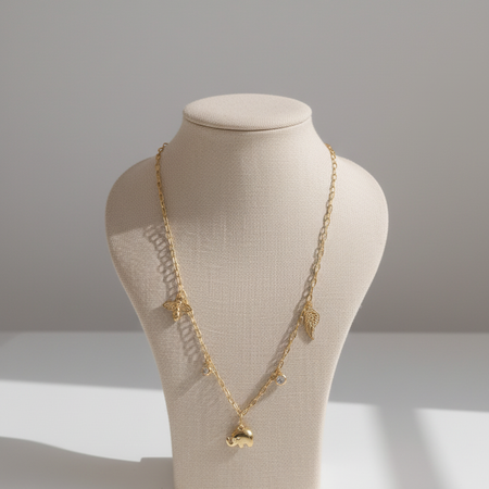 Gold-Plated Elephant Charm Necklace with Wing and Bee Pendants and Stone Accents