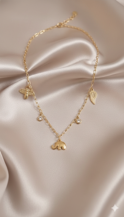 Gold-Plated Elephant Charm Necklace with Wing and Bee Pendants and Stone Accents